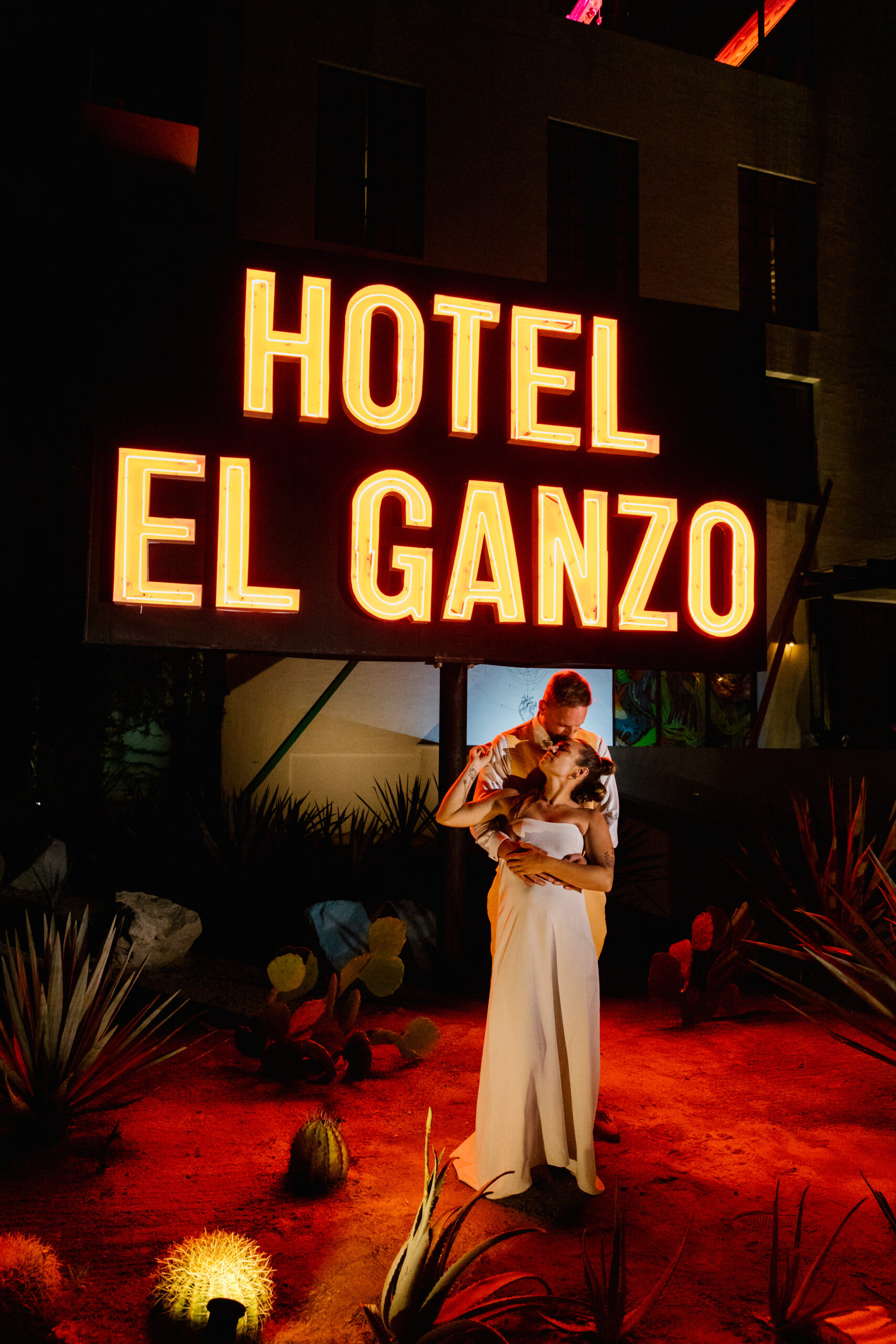 hotel el ganzo neon sign late night bride and groom portrait destination mexico wedding