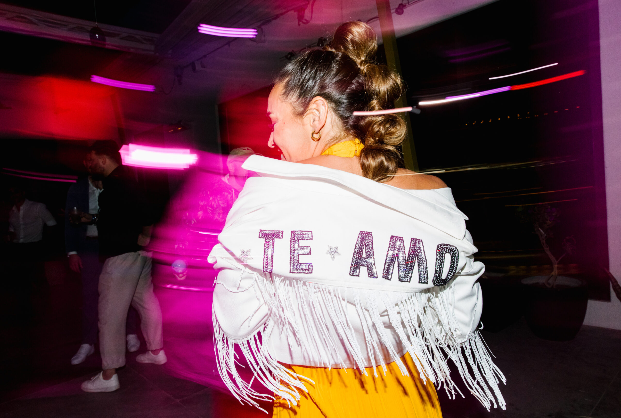 blurry photo style te amo bridal jacket with white fringe yellow after party dress high bubble pony tail wedding dance party
