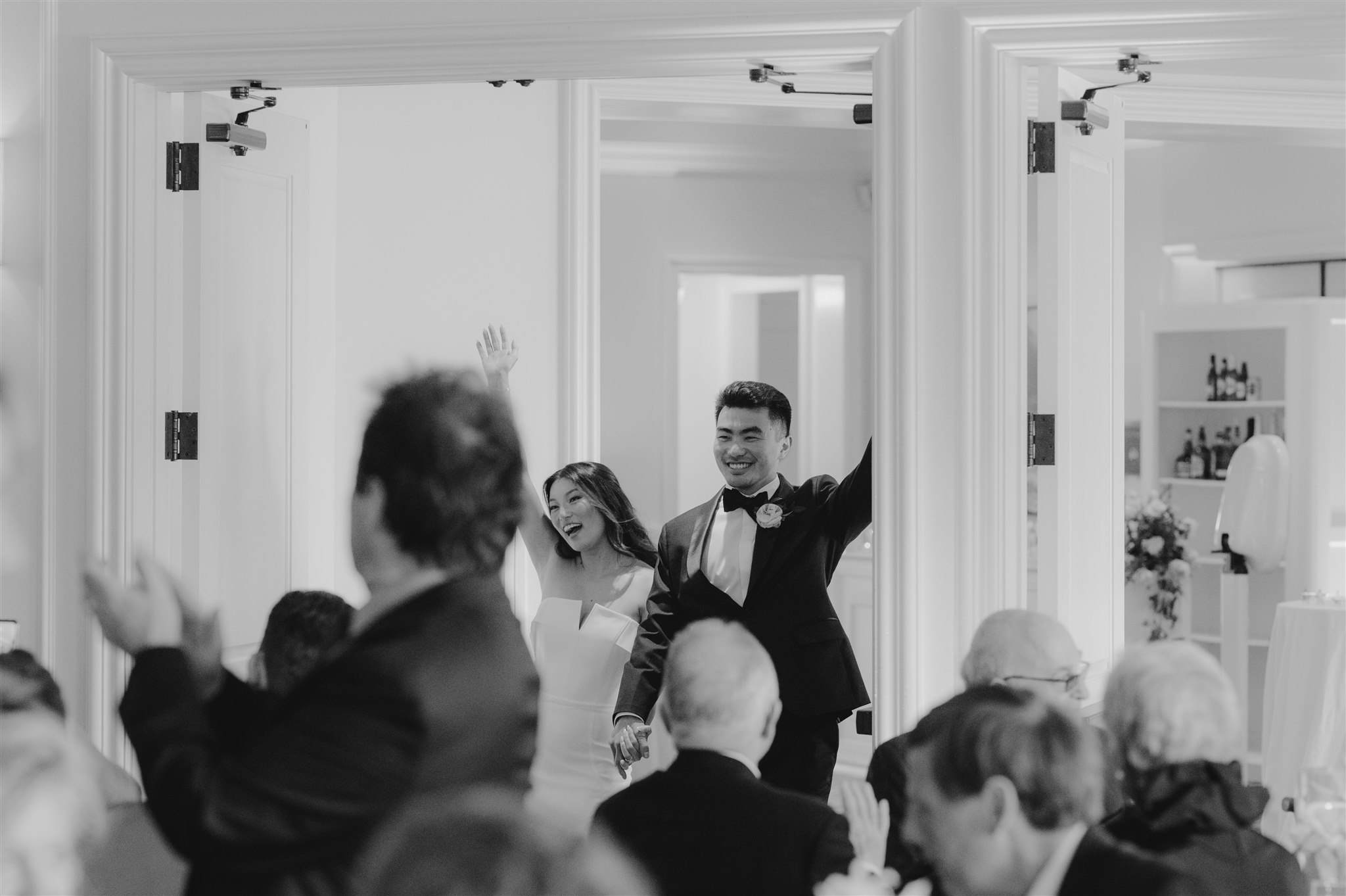black and white portrait bride and groom just married wedding reception happy smiles