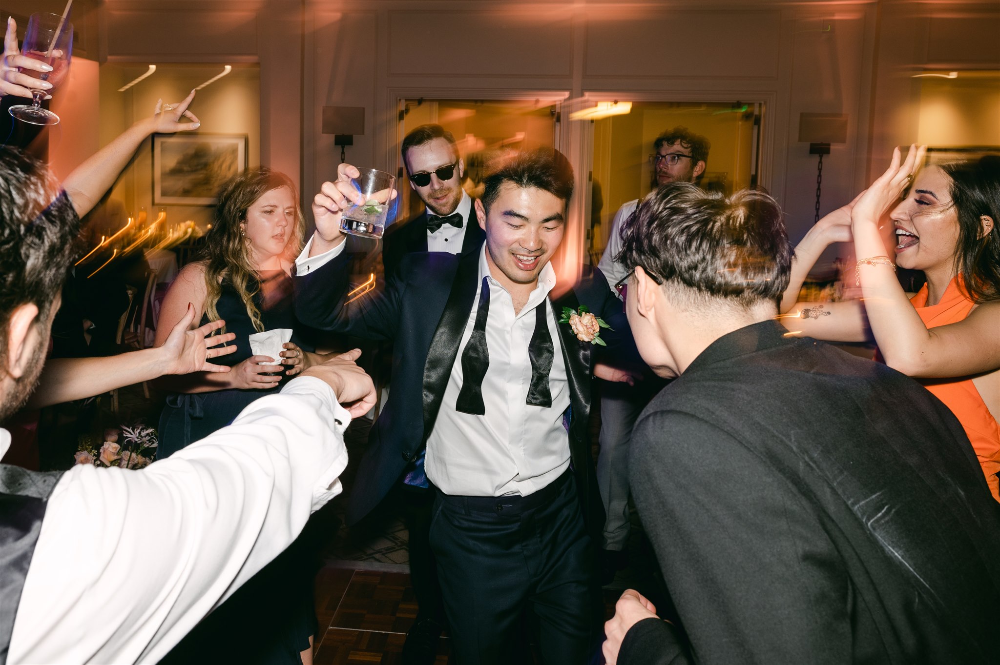 wedding dance party groom on the dancefloor vintage blurred effect